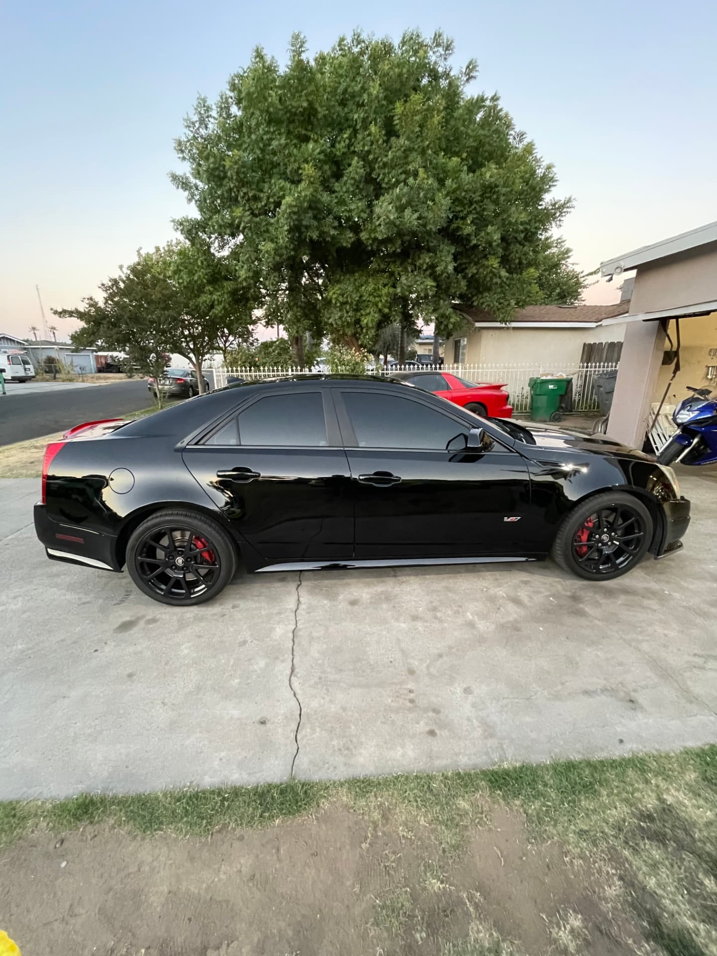 Black Cadillac CTS-V with dark tinted windows